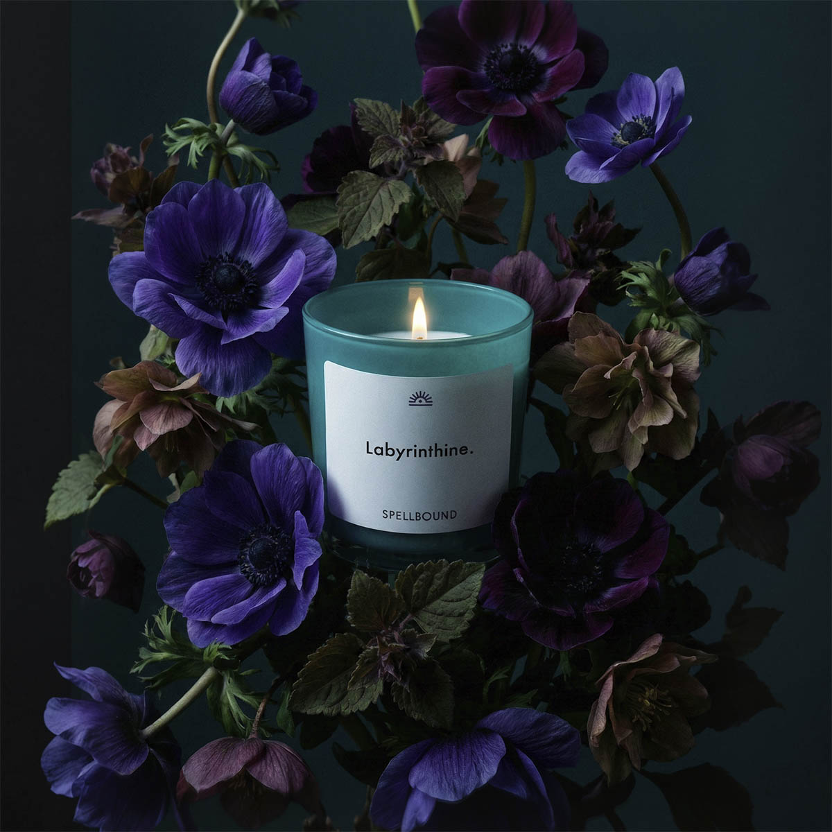 Labyrinthine luxury scented candle surrounded by bergamot, violet & tonka bean. Premium handcrafted candle with personalised labels by Spellbound.